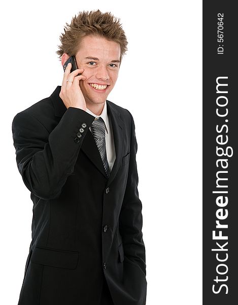 A young businessman on his pda device. A young businessman on his pda device