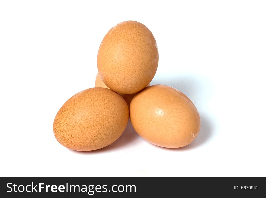 Four eggs, isolated on white