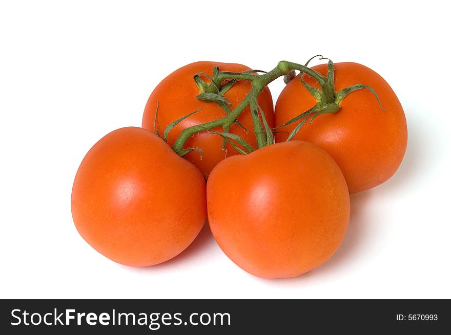 Four tomatoes, isolated on white