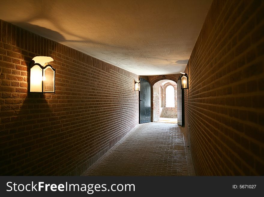 Old stone tunnel under baroque palace. Old stone tunnel under baroque palace