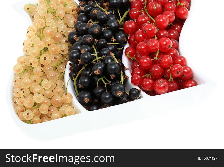 Bowl of currants isolated on a white backgroud. Bowl of currants isolated on a white backgroud.
