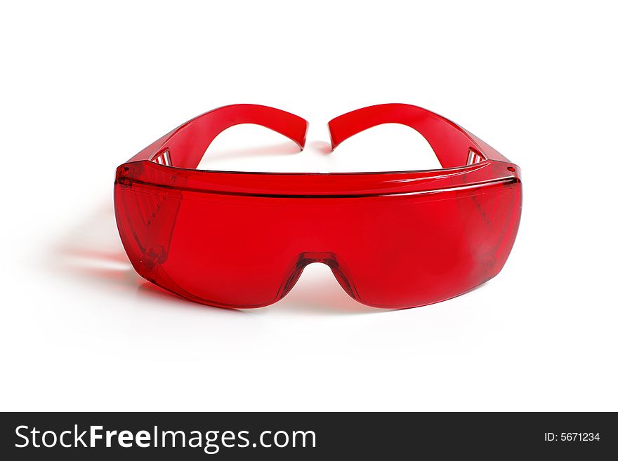Red goggles on a white background. Red goggles on a white background