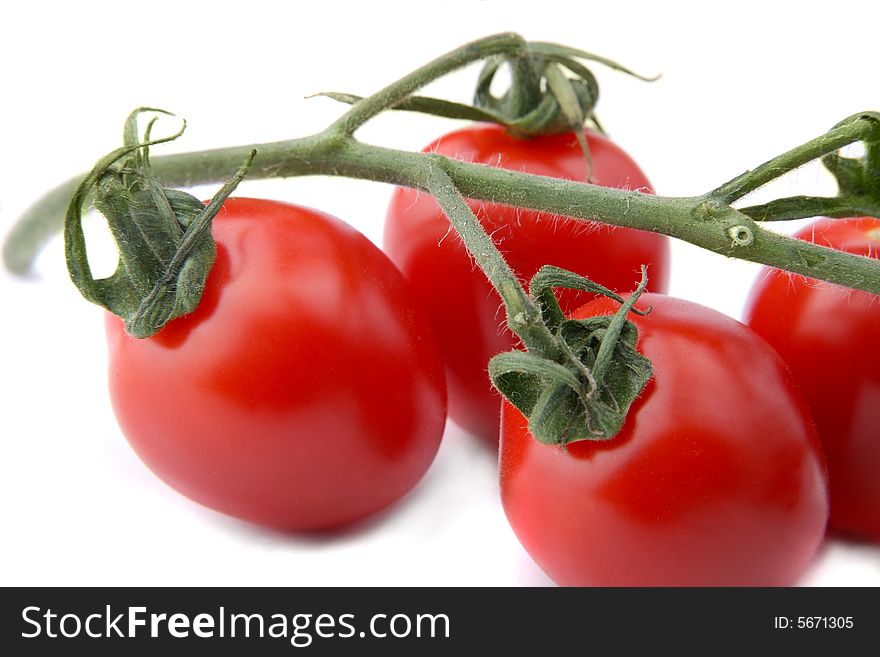 Cherry tomatoes on the vine. Cherry tomatoes on the vine
