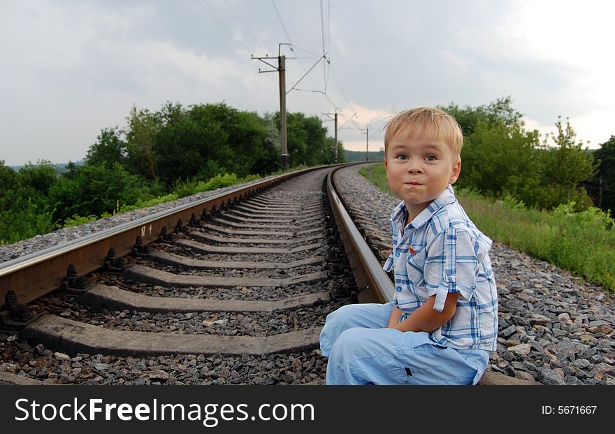 Boy On The Railway