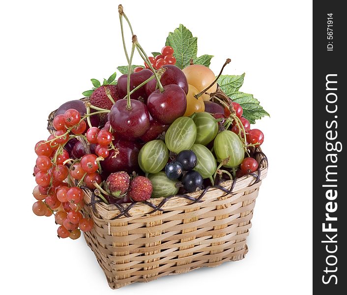 Mixed berries in basket on white background. Mixed berries in basket on white background.