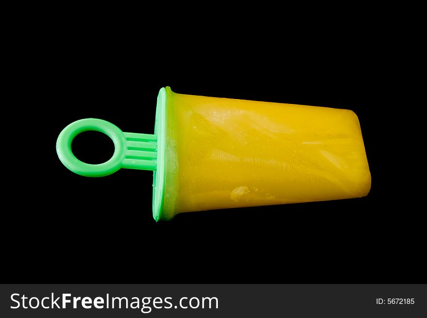 Colorful popsicle isolated in a black background