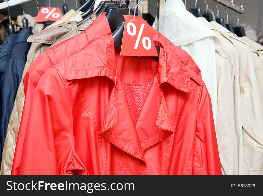 Outerwear on sale, red female outdoor clothes.
