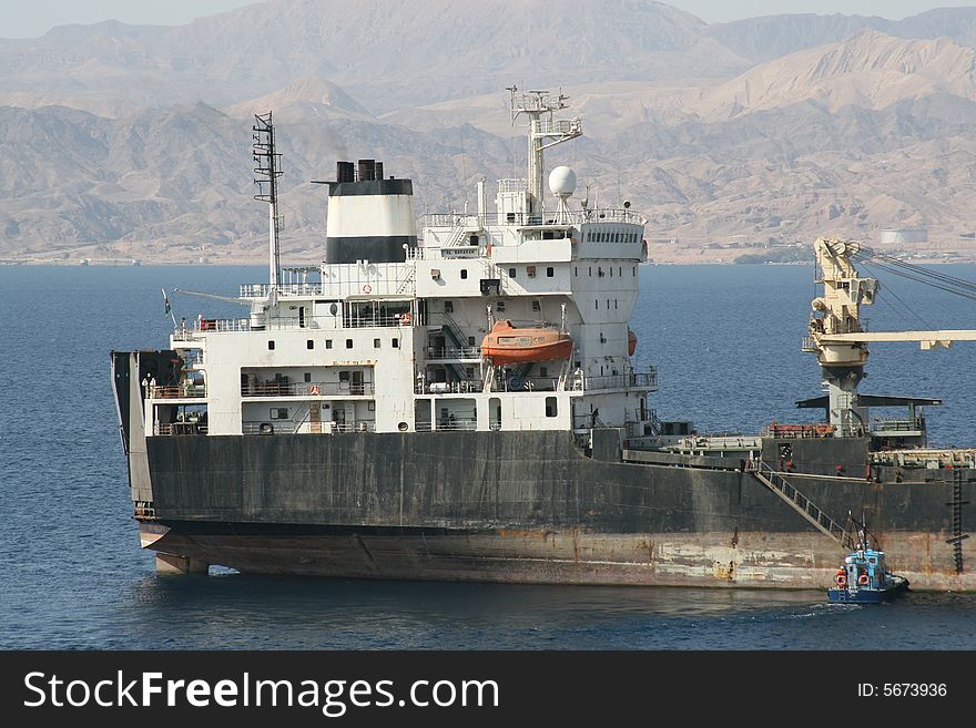 Cargo ship taking pilot on board Aqaba Jordan. Cargo ship taking pilot on board Aqaba Jordan