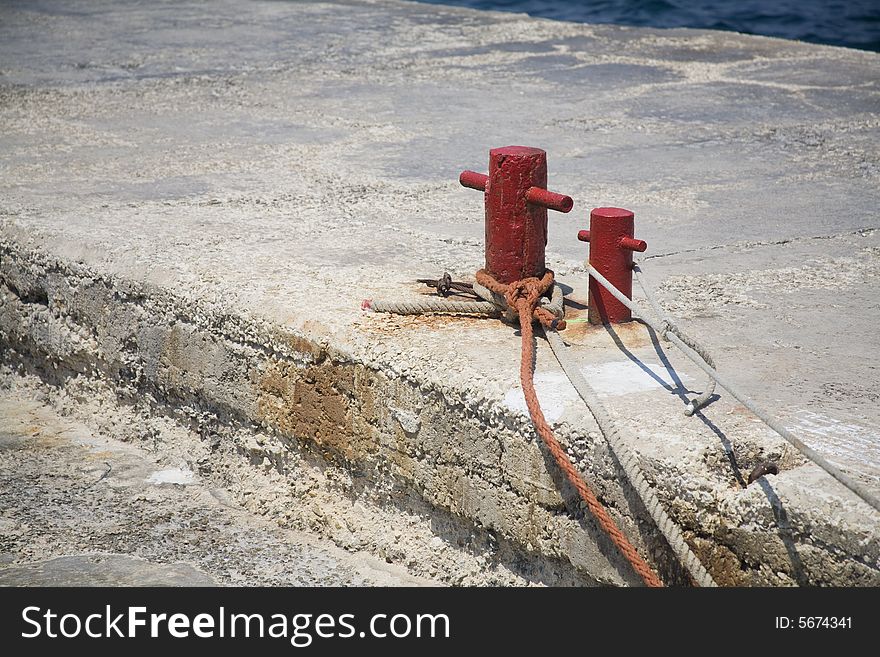 Detail of harbor with water and chain