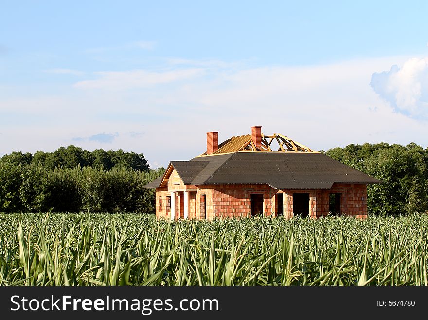 Construction site of a new house at corn field