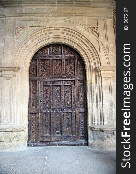Wooden door in a monastery in Najera in La Rioja, Spain