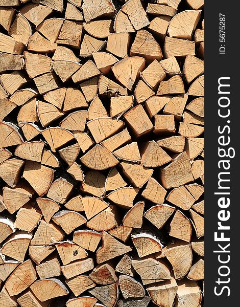 The heap of birchen logs as background. The heap of birchen logs as background