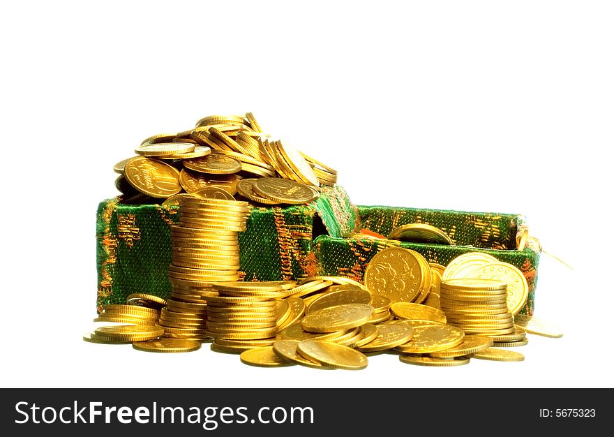 Riches, gold coins in a chest isolated on white