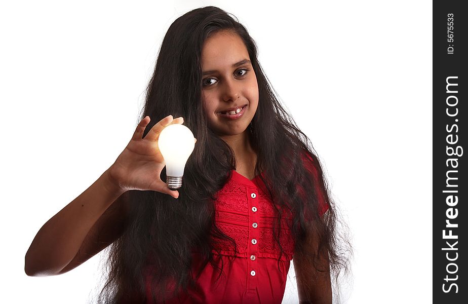 11 year old girl holding a light bulb. 11 year old girl holding a light bulb