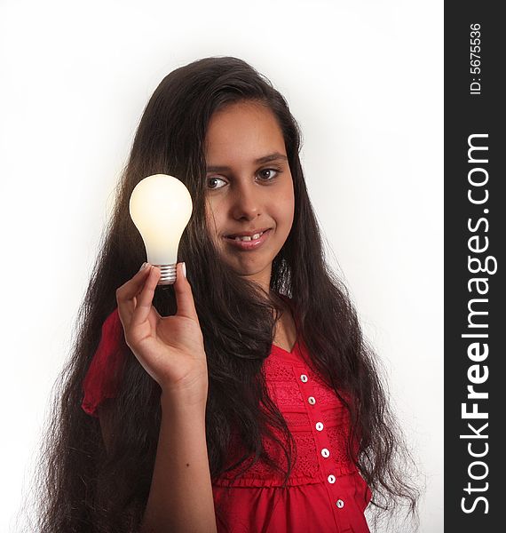 11 year old girl holding a light bulb. 11 year old girl holding a light bulb