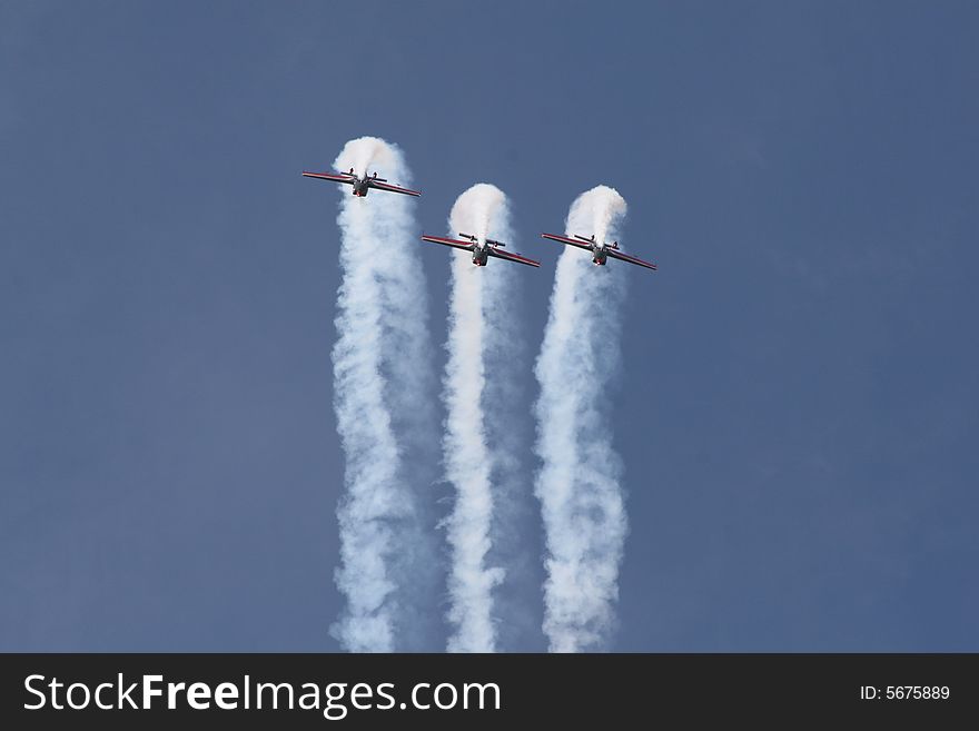 Three jordanian airforce aircraft looping in formation. Three jordanian airforce aircraft looping in formation