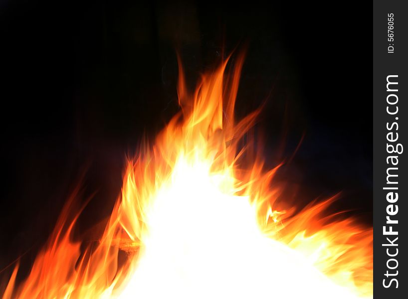 Background with bright yellow fire. Background with bright yellow fire
