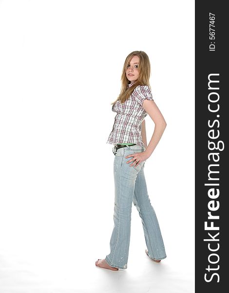 Full length picture of young woman standing with her hand on hip. Full length picture of young woman standing with her hand on hip