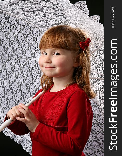 Cute girl in red with a lace parasol. Cute girl in red with a lace parasol