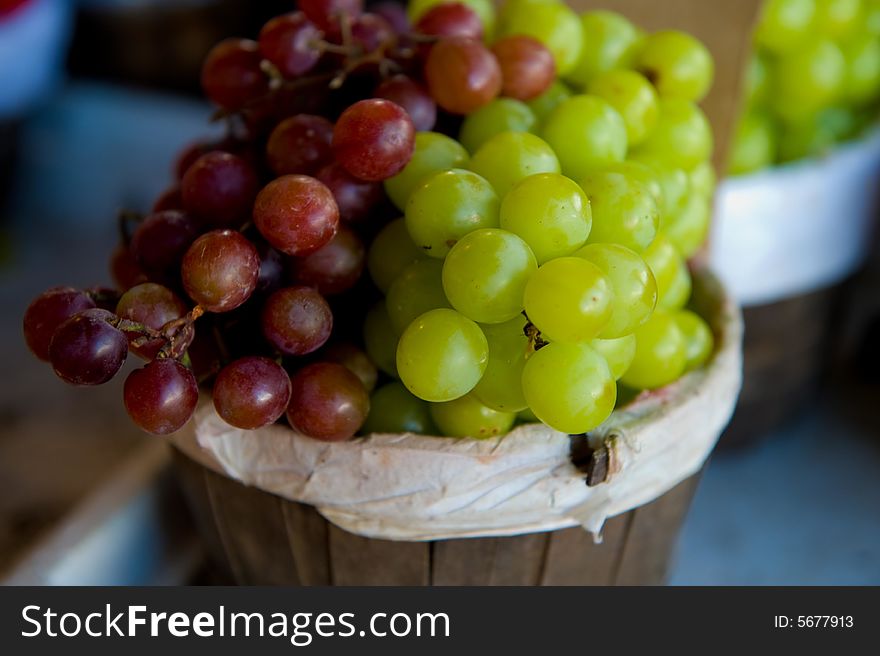 Juicy clusters of red and green grapes