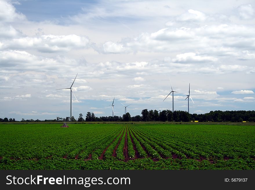 Several wind energy turbines on a farm. Several wind energy turbines on a farm