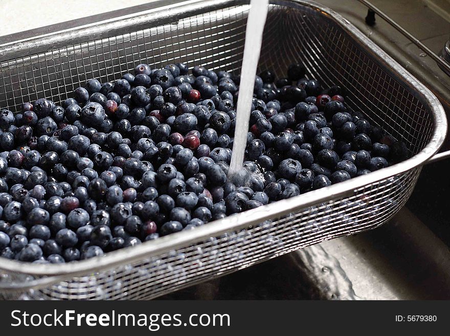 Freshly picked and washed blueberries, ready to eat.