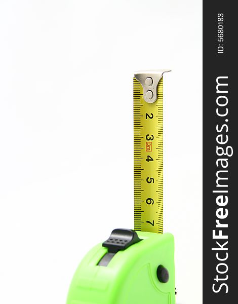 An upright measuring tape with tape partially extended.
