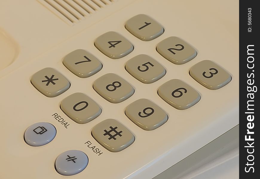 Close up buttons of gray office telephone