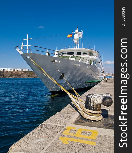 Small cruise ship near the pier