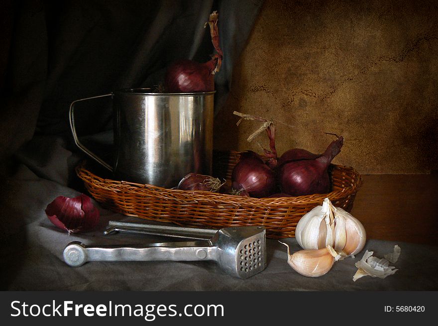 Red onions and garlic press