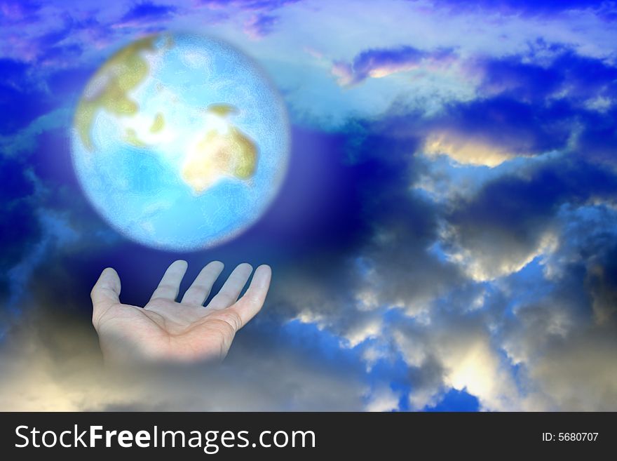 Abstract scene of the hand of the person keeps brighten planet on background cloud