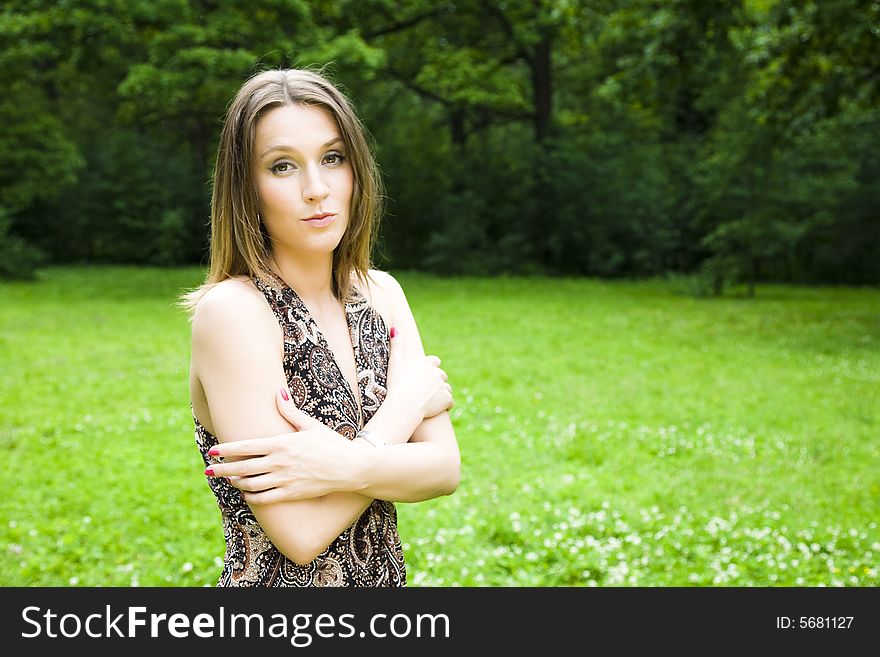 Confident business woman relaxing in the park. Confident business woman relaxing in the park