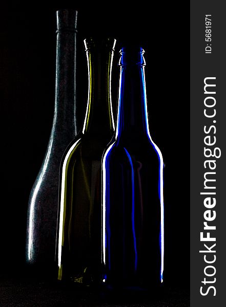 Silhouettes Of Bottles Of Wine