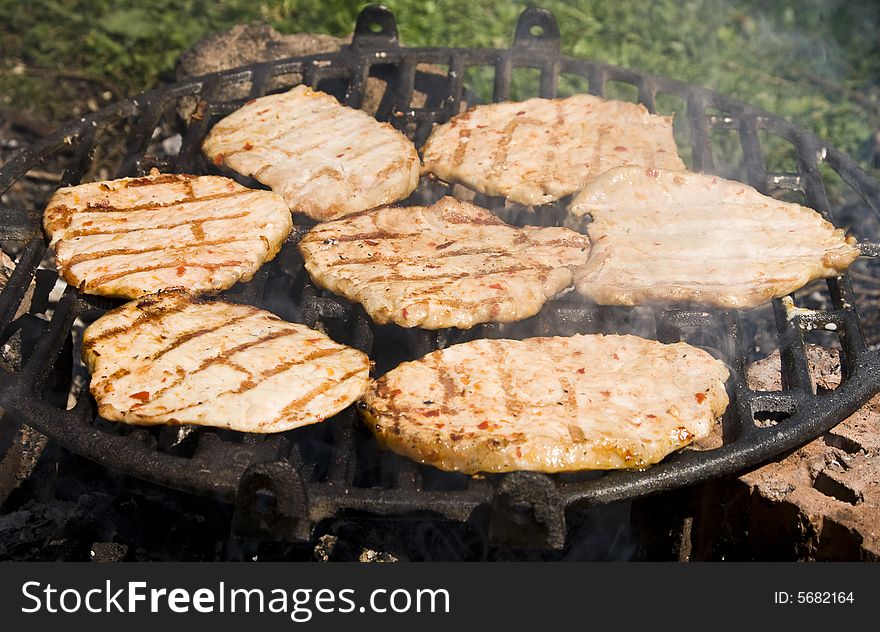 Barbecue of pork made on an outdoor grill