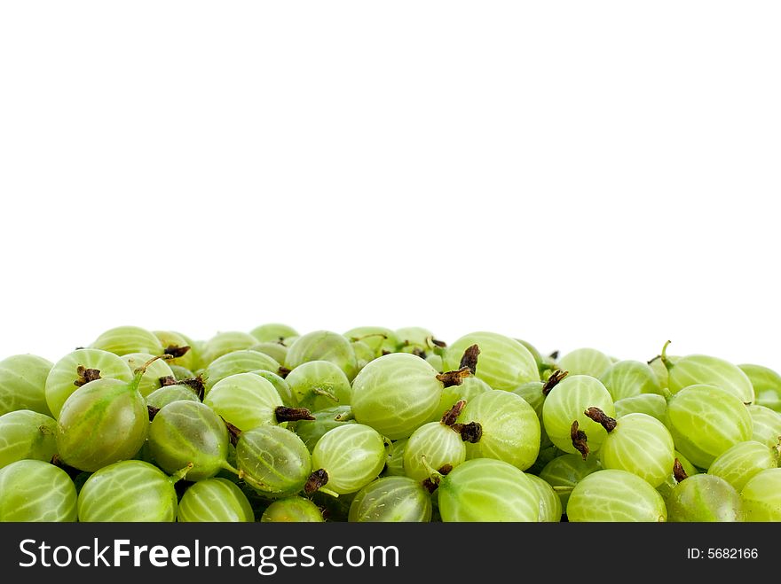 Pile of green gooseberries isolated on the white background