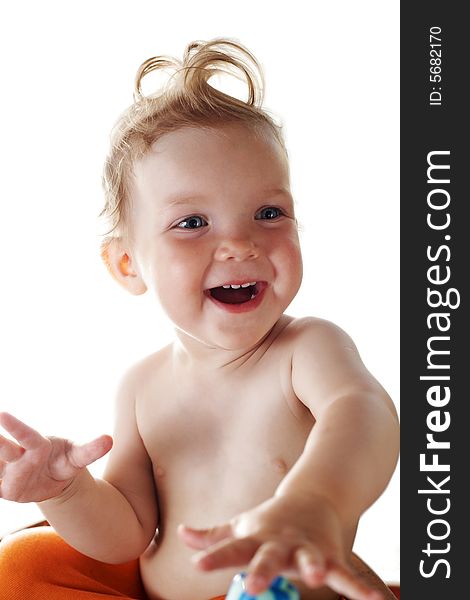 An image of smiling baby-girl. Isolated in studio. An image of smiling baby-girl. Isolated in studio.
