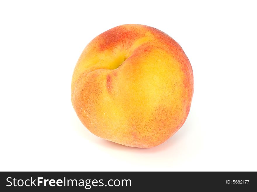 Single orange peach isolated on the white background