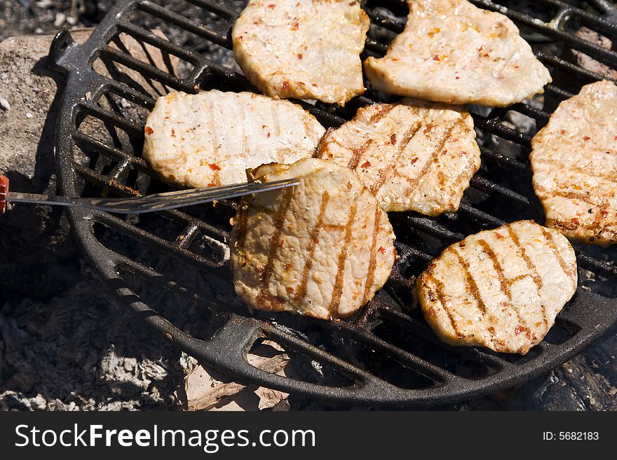 Barbecue of pork made on an outdoor grill