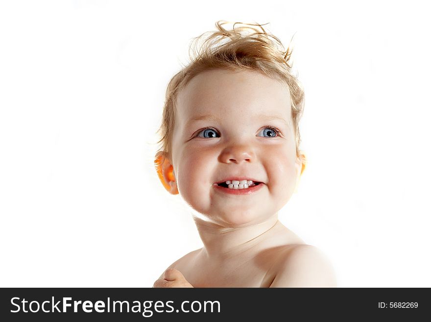 An image of smiling girl. Isolated in studio. An image of smiling girl. Isolated in studio.