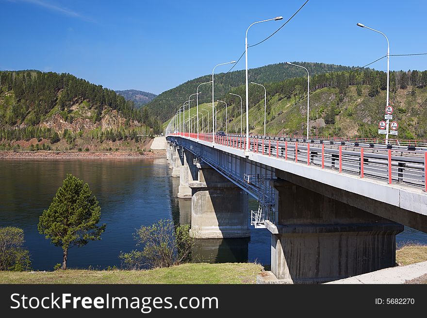 Bridge on the river in siberia