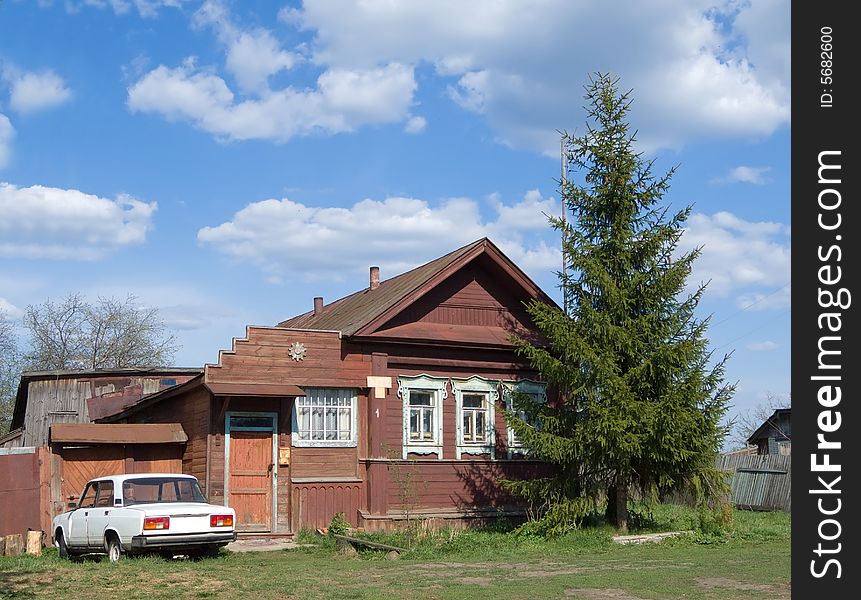 Dwelling wooden cottage in the village