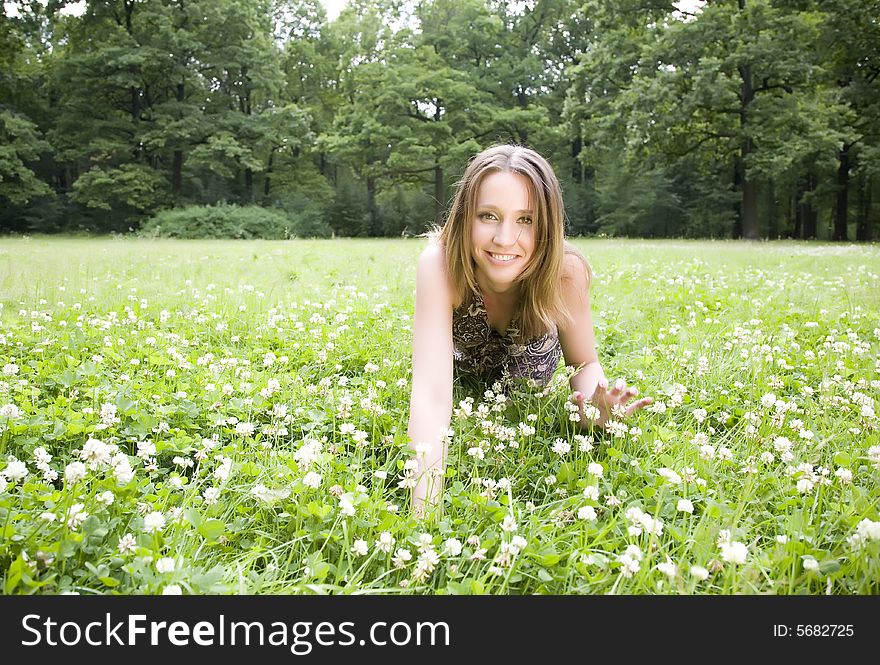 Young Beauty Women Laying On The Grass