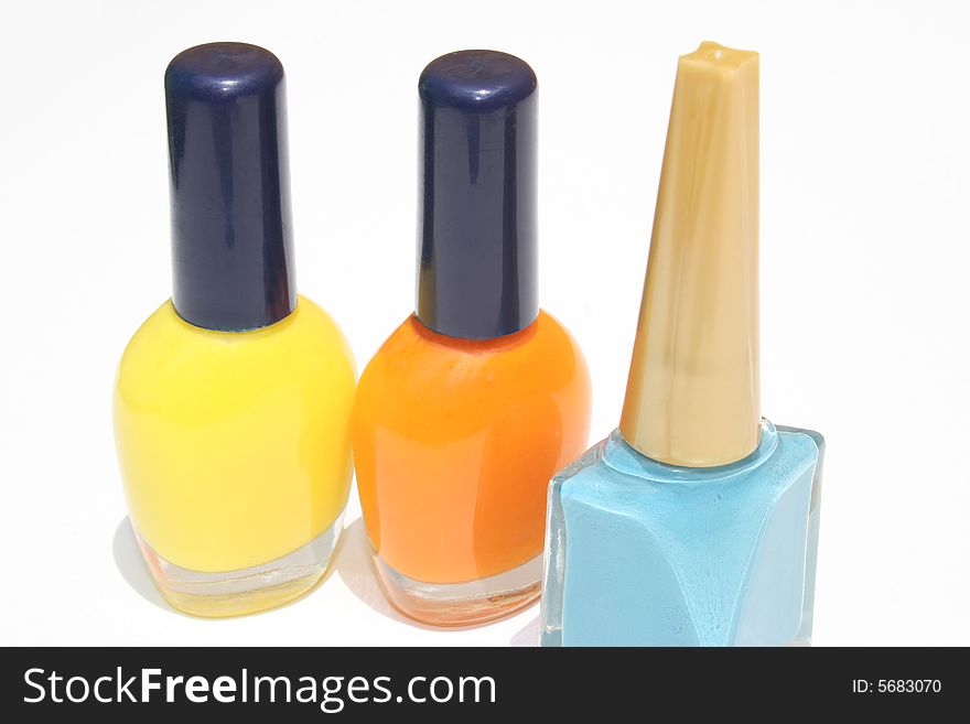 Nail polish bottles isolated against white background