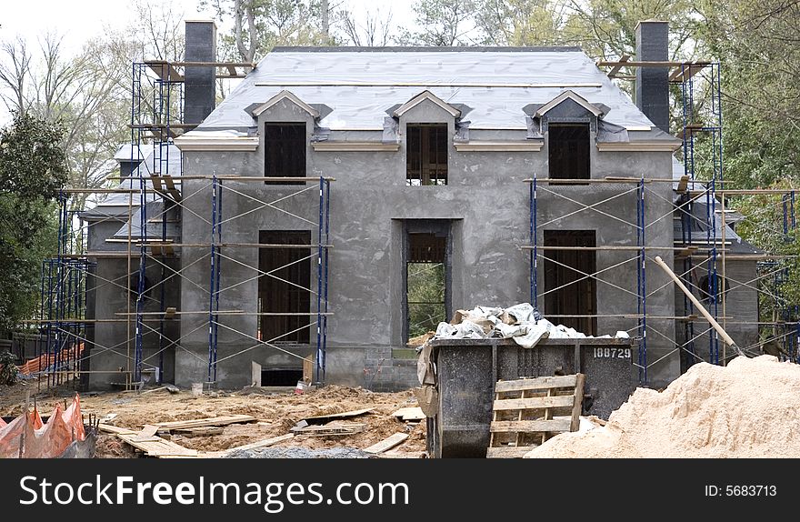 A new mansion under construction with concrete walls