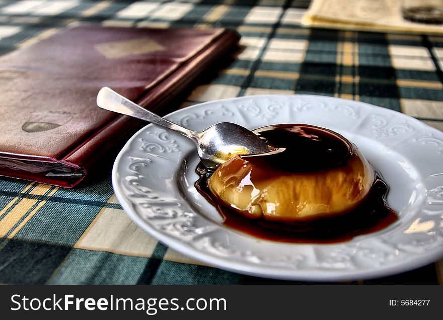 The photo was taken in Florence, Italy in a restaurant. Pudding with caramel.