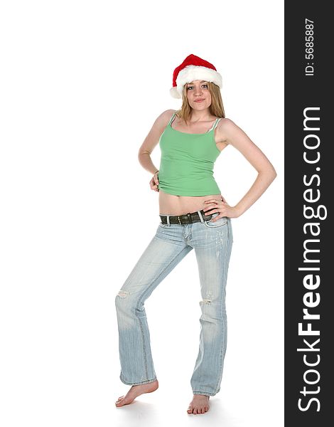 Young woman in skimpy shirt and santa hat. Young woman in skimpy shirt and santa hat