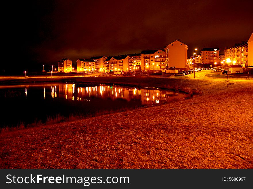 City in the night, pond, night light. City in the night, pond, night light