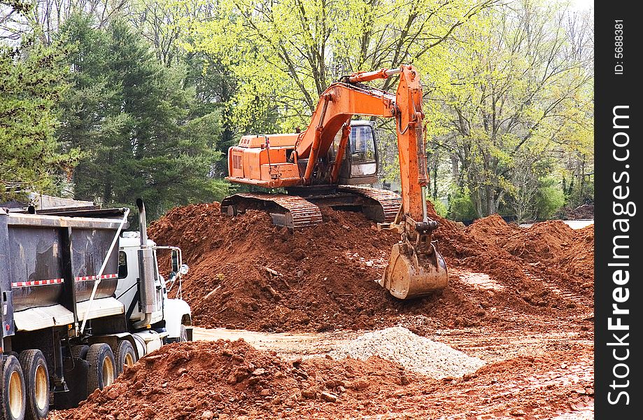 Orange Loader And Dump Truck