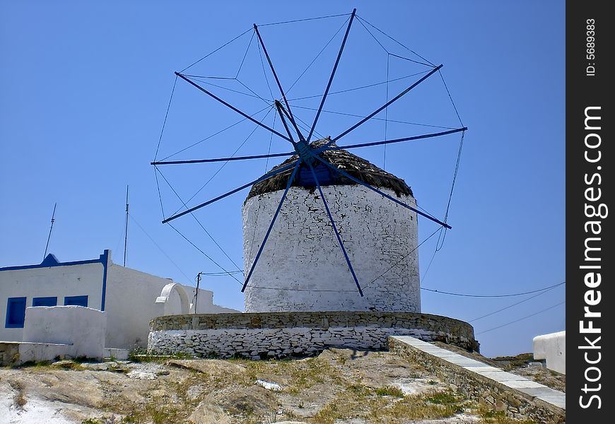 Old windmill in the village of Chora, on los Island. Old windmill in the village of Chora, on los Island.