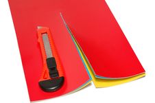 Knife And Color Paper Stock Photography